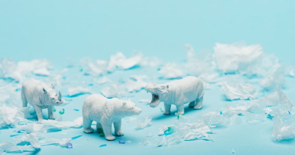 Climate change impact illustration with melting polar animals