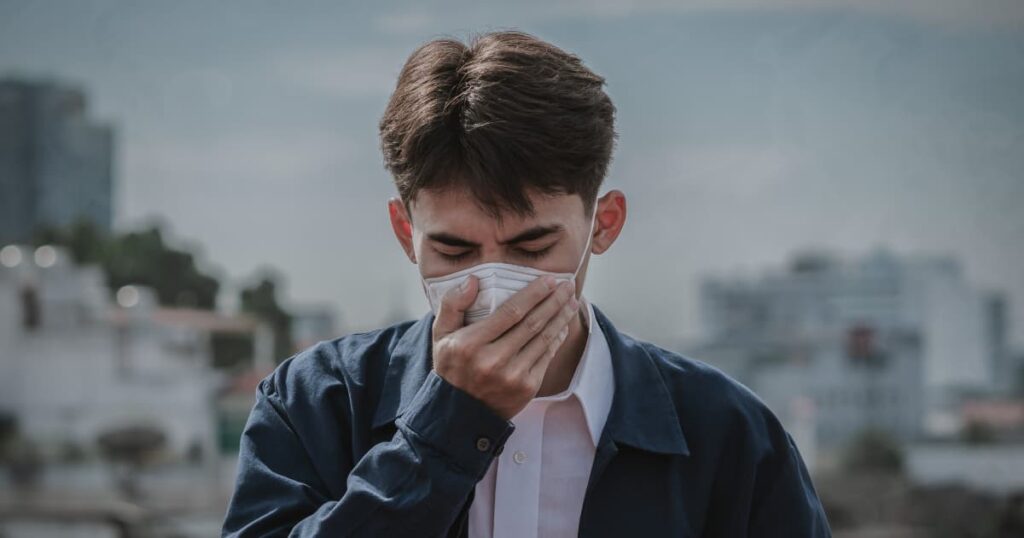 Person wearing a protective mask